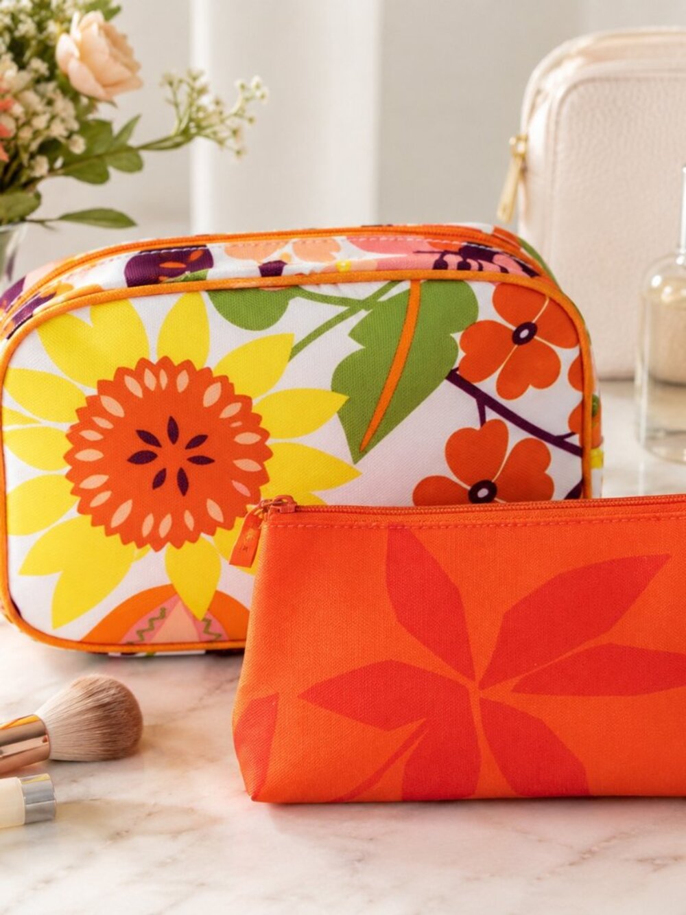 Clinique Pair of Cosmetic Floral Orange Zip Bags